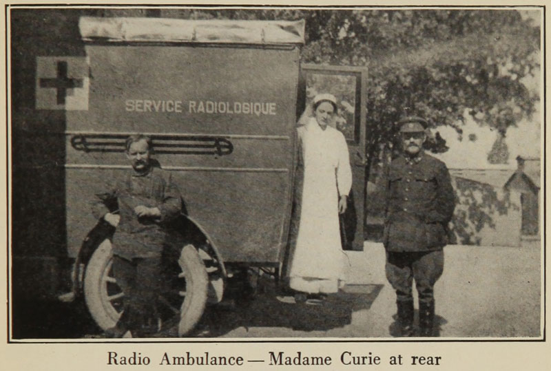 Marie Curie inspecting a motorised ambulance fitted with X-ray equipment (1918)