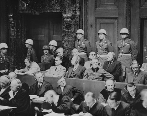 International Military Tribunal Nuremberg The defendants listen as the prosecution begins introducing documents at the International Military Tribunal trial of war criminals at Nuremberg. Date: Nov 22, 1945