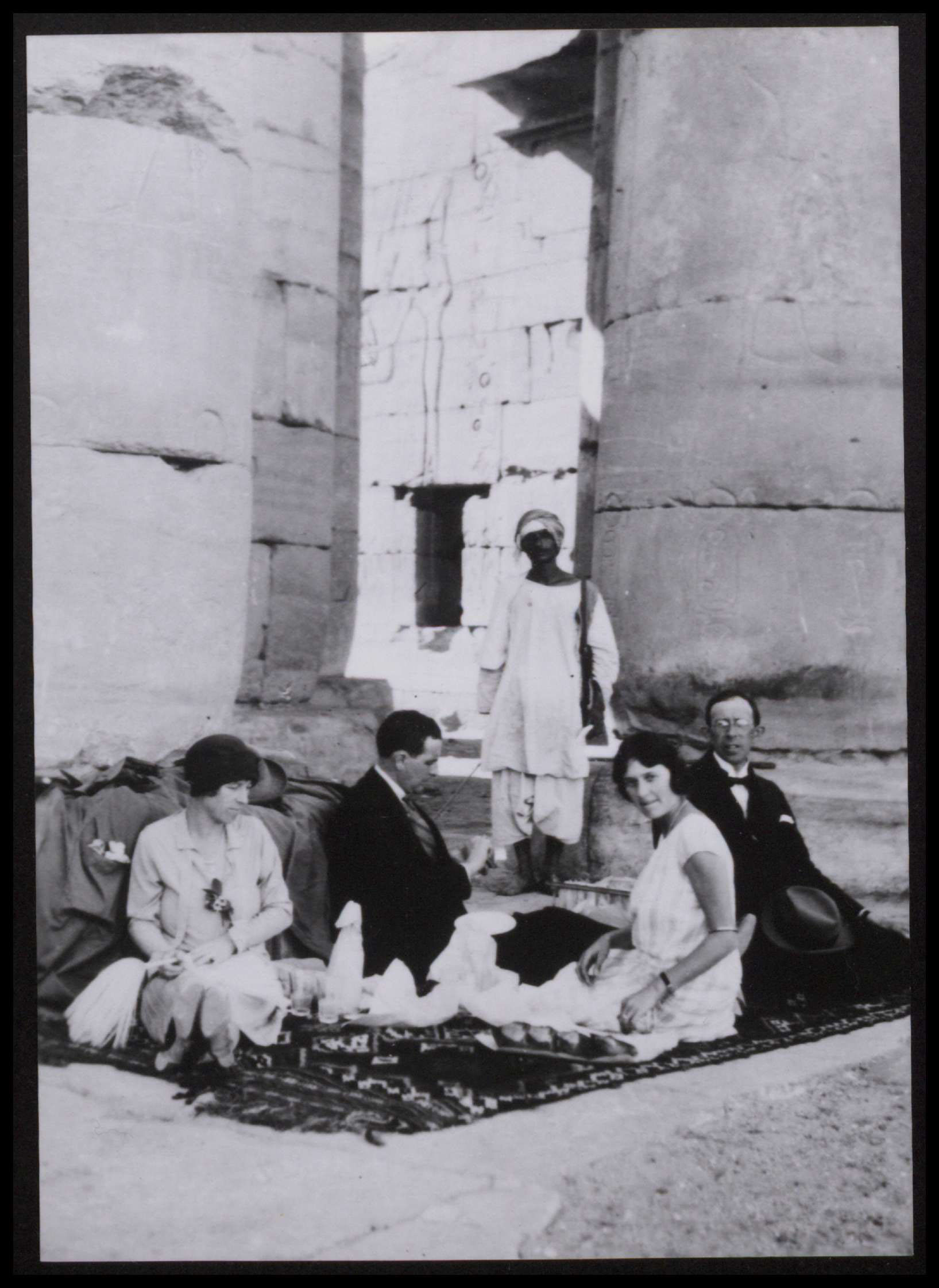 Tourists picnicking at an Egyptian temple [from a later Thomas Cook trip]